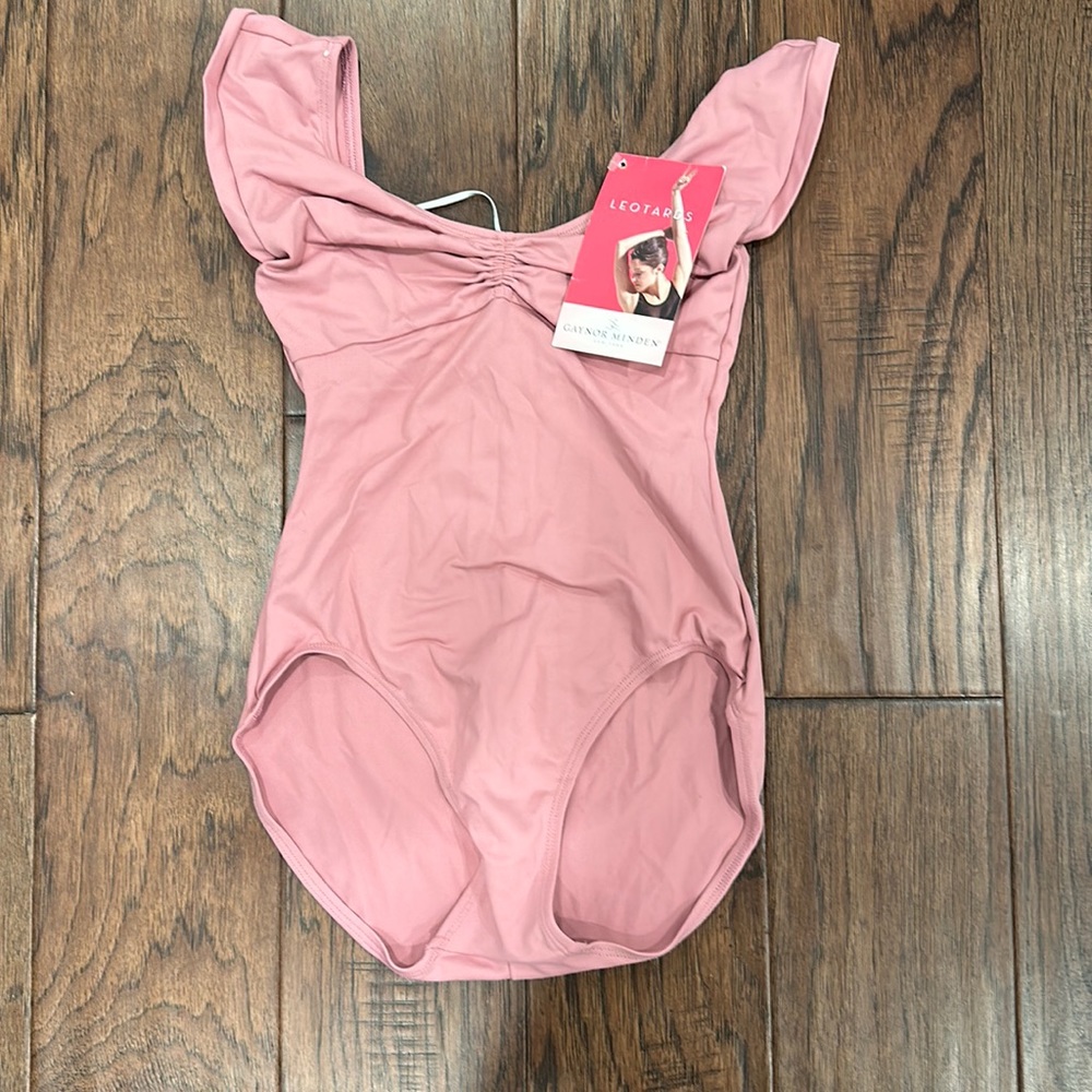 Gaynor Minden cap sleeve leotard is in dusty rose in size petite.
